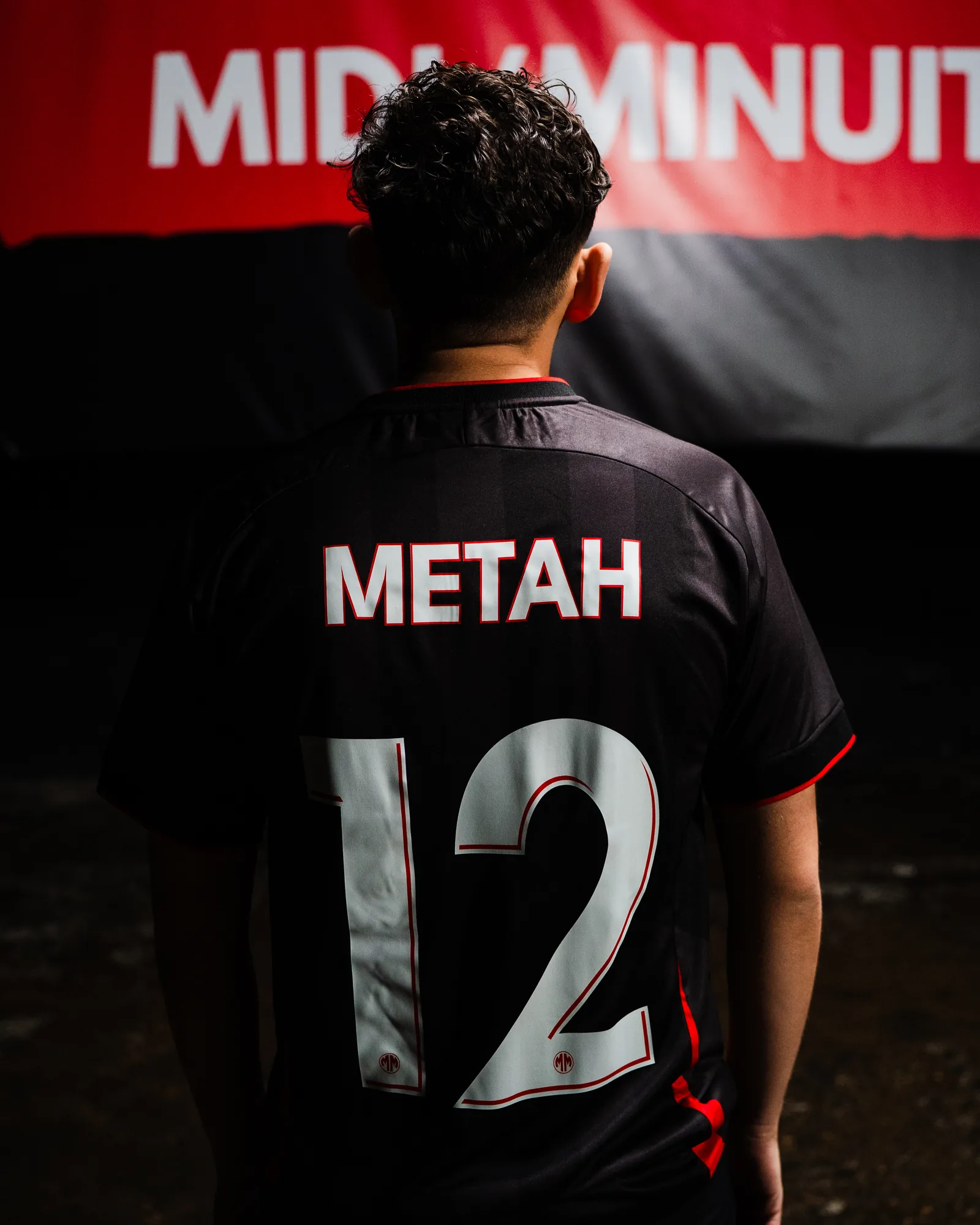 Metah de dos, maillot n°12 floqué à son nom